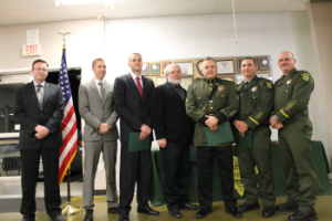 Pictured L to R: Deputy Jamey Morgan, Deputy Jordan Thomson, Deputy Ryan Carpenter, Communications Manager Frank Yost, Sgt. Jeff Leikauf, Lt. Bryan Golmitz and Lt. James Byers